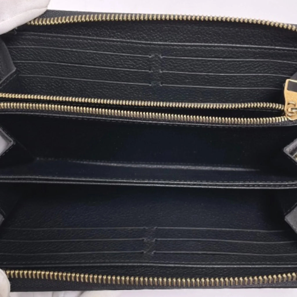 Vuitton M61864 Louis Round Long Monogram Wallet LV (Good) Noir VUITTON Zipper Empreinte LOUIS Zippy Pre-Owned