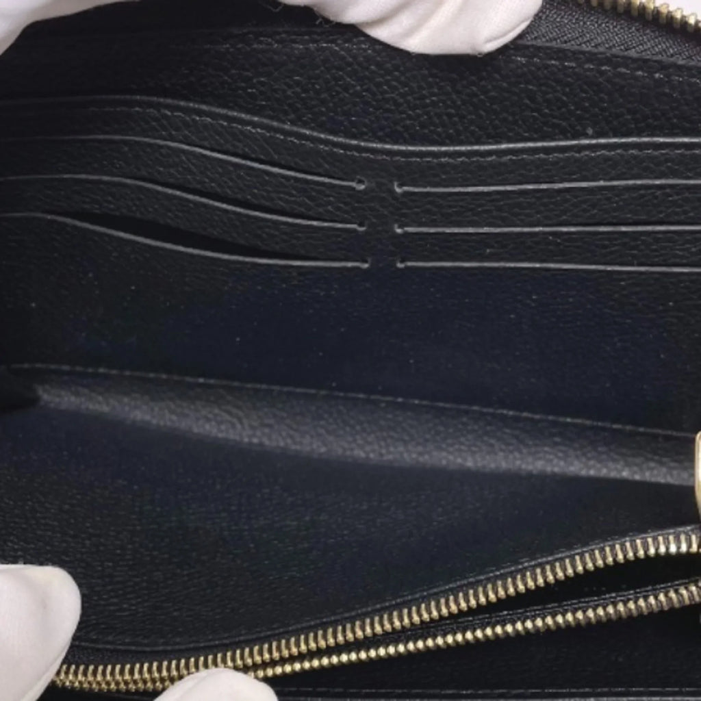 Vuitton M61864 Louis Round Long Monogram Wallet LV (Good) Noir VUITTON Zipper Empreinte LOUIS Zippy Pre-Owned
